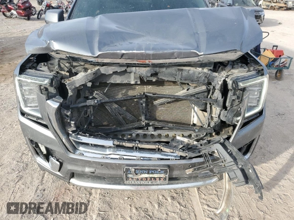 2021 GMC Yukon XL SLT with VIN 1GKS1GKD6MR408992, listed as a Copart auction lot 85475094 with 74,279 mi miles and Salvage Title. Bid and sale history available at carsss.com. Image 12.