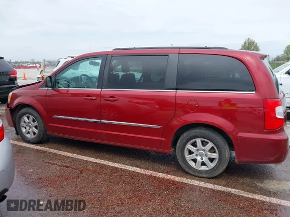 2012 Chrysler Town & Country Touring with VIN 2C4RC1BG8CR344068, listed as a IAAI auction lot 41970494 with 130,559 mi miles. Bid and sale history available at carsss.com. Image 14.