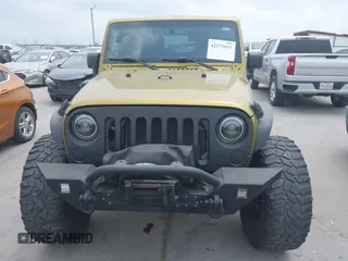 2008 Jeep Wrangler Unlimited Sahara with VIN 1J8GA59108L574959, listed as a IAAI auction lot 42171011 with Not Provided miles and . Bid and sale history available at carsss.com. Image 12.