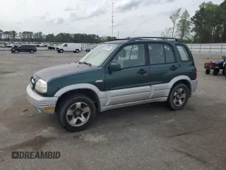 1999 Suzuki Grand Vitara JLX z VIN JS3TD62V0X4124366, wystawiony jako Copart lot #50885055 z przebiegiem 204 168 mil mil oraz Szkoda całkowita • Salvage title. Historia ofert i sprzedaży dostępna na DreamBid. Obrazek 1.