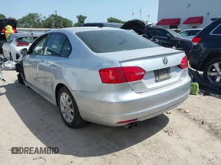 2012 Volkswagen Jetta SE with VIN 3VWBP7AJXCM340937, listed as a IAAI auction lot 42526373 with 157,113 mi miles and . Bid and sale history available at DreamBid. Image 3.