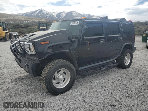 2004 Hummer H2 z VIN 5GRGN23U74H100175, wystawiony jako Copart lot #52642125 z przebiegiem 112 305 mil mil oraz Szkoda całkowita • Salvage title. Historia ofert i sprzedaży dostępna na DreamBid. Obrazek 1.