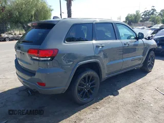 2020 Jeep Grand Cherokee Laredo E with VIN 1C4RJEAG3LC247027, listed as a IAAI auction lot 42538279 with 97,601 mi miles and . Bid and sale history available at DreamBid. Image 4.