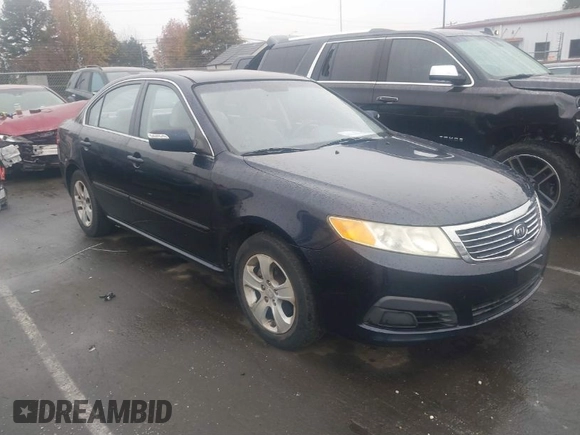 2009 Kia Optima LX z VIN KNAGE228095303047, wystawiony jako IAAI lot #41128475 z przebiegiem 165 317 mil mil oraz . Historia ofert i sprzedaży dostępna na DreamBid. Obrazek 1.