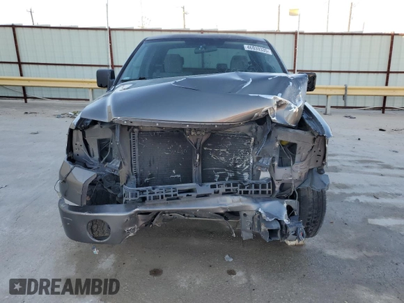 2007 Ford F-150 STX with VIN 1FTRX12W97KD12990, listed as a Copart auction lot 46939335 with 216,759 mi miles and Salvage Title. Bid and sale history available at DreamBid. Image 5.