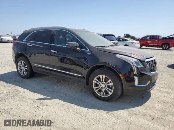 2020 Cadillac XT5 Premium Luxury AWD with VIN 1GYKNDRS6LZ129215, listed as a Copart auction lot 60238685 with 128,310 mi miles and Clean title. Bid and sale history available at DreamBid. Image 4.