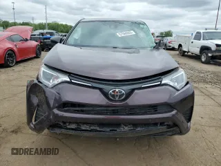 2018 Toyota RAV4 LE with VIN 2T3BFREV0JW773614, listed as a Copart auction lot 57568865 with 76,429 mi miles and Clean title. Bid and sale history available at DreamBid. Image 5.