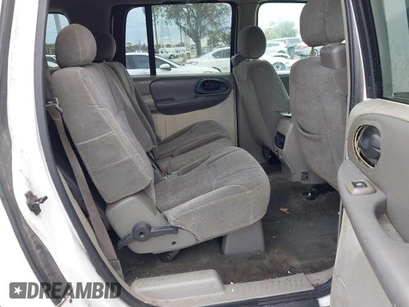 2003 Chevrolet TrailBlazer EXT LT with VIN 1GNES16S736235213, listed as a IAAI auction lot 41237480 with 297,434 mi miles and . Bid and sale history available at DreamBid. Image 8.