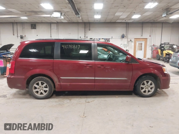 2012 Chrysler Town & Country Touring with VIN 2C4RC1BG1CR314023, listed as a IAAI auction lot 41078817 with Not Provided miles and . Bid and sale history available at DreamBid. Image 13.