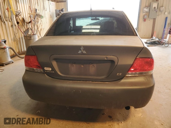 2006 Mitsubishi Lancer ES z VIN JA3AJ26EX6U067642, wystawiony jako Copart lot #51628485 z przebiegiem 163 060 mil mil oraz Szkoda całkowita • Salvage title. Historia ofert i sprzedaży dostępna na DreamBid. Obrazek 6.