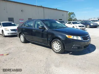 2010 Kia Optima LX with VIN KNAGG4A89A5411534, listed as a IAAI auction lot 41652470 with 147,432 mi miles. Bid and sale history available at carsss.com. Image 1.