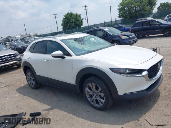 2021 Mazda CX-30 Premium with VIN 3MVDMBDL0MM307045, listed as a IAAI auction lot 42446494 with 33,112 mi miles and . Bid and sale history available at DreamBid. Image 1.