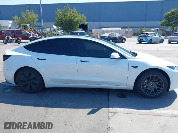 2025 Tesla Model 3 Long Range with VIN 5YJ3E1EB3SF914858, listed as a IAAI auction lot 42719707 with 5,849 mi miles and . Bid and sale history available at DreamBid. Image 14.