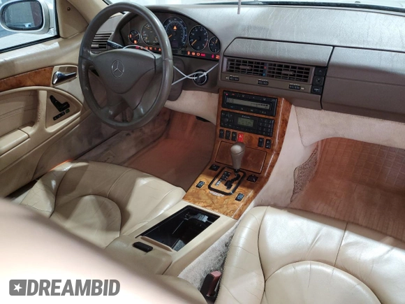 1999 Mercedes-Benz SL-Class with VIN WDBFA68F9XF172312, listed as a Copart auction lot 61248884 with 104,331 mi miles and Salvage Title. Bid and sale history available at carsss.com. Image 8.