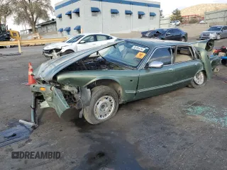 1999 Jaguar XJ z VIN SAJKX6049XC854232, wystawiony jako Copart lot #76191414 z przebiegiem Nie podano mil oraz Szkoda całkowita • Salvage title. Historia ofert i sprzedaży dostępna na DreamBid. Obrazek 1.