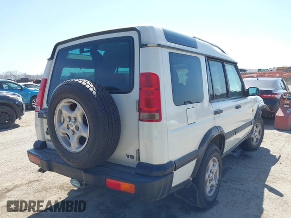 2000 Land Rover Discovery Cloth z VIN SALTY124XYA262828, wystawiony jako IAAI lot #41769729 z przebiegiem 215 711 mil mil oraz . Historia ofert i sprzedaży dostępna na DreamBid. Obrazek 4.