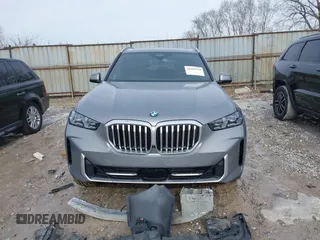 2025 BMW X5 xDrive40i with VIN 5UX23EU02S9X44610, listed as a IAAI auction lot 41469794 with 1,964 mi miles. Bid and sale history available at carsss.com. Image 13.
