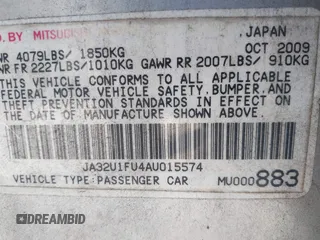 2010 Mitsubishi Lancer DE with VIN JA32U1FU4AU015574, listed as a IAAI auction lot 41770332 with 125,458 mi miles. Bid and sale history available at carsss.com. Image 9.