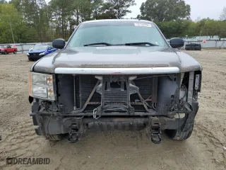 2007 GMC Sierra 1500 SLE1 with VIN 2GTEC19J671664140, listed as a Copart auction lot 73134294 with 148,321 mi miles and Salvage Title. Bid and sale history available at carsss.com. Image 5.