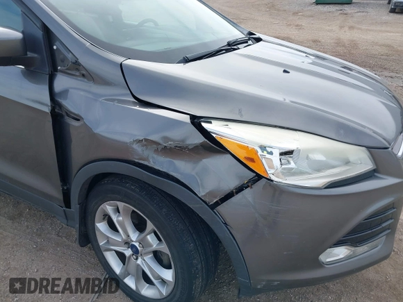 2013 Ford Escape SEL with VIN 1FMCU0HX0DUD71088, listed as a IAAI auction lot 41880044 with 155,439 mi miles. Bid and sale history available at carsss.com. Image 6.