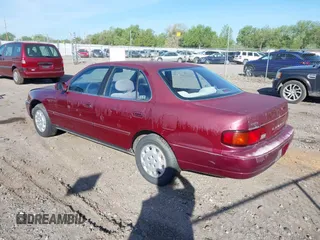 1996 Toyota Camry DX z VIN JT2BG12K4T0363844, wystawiony jako IAAI lot #42215996 z przebiegiem 214 452 mil mil oraz . Historia ofert i sprzedaży dostępna na DreamBid. Obrazek 3.