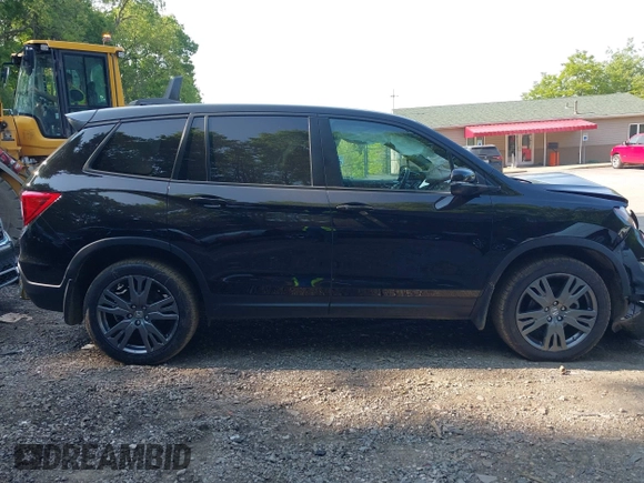 2021 Honda Passport EX-L с VIN 5FNYF8H57MB022083, выставлен на аукционе IAAI как лот 42399294 с пробегом 61 014 миль миль и . История ставок и продаж доступна на DreamBid. Изображение 14.