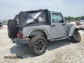 2013 Jeep Wrangler Sport with VIN 1C4AJWAG0DL696928, listed as a Copart auction lot 60822915 with 169,503 mi miles and Salvage title. Bid and sale history available at DreamBid. Image 3.