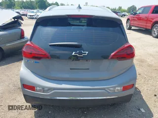 2021 Chevrolet Bolt EV Premier z VIN 1G1FZ6S01M4106836, wystawiony jako IAAI lot #42438764 z przebiegiem 27 894 mil mil oraz . Historia ofert i sprzedaży dostępna na DreamBid. Obrazek 16.
