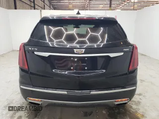 2023 Cadillac XT5 FWD Premium Luxury with VIN 1GYKNCRS6PZ171335, listed as a Copart auction lot 51859385 with 52,691 mi miles and Clean Title. Bid and sale history available at carsss.com. Image 6.