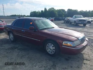 2004 Mercury Grand Marquis LS Premium z VIN 2MEFM75WX4X671041, wystawiony jako IAAI lot #42261517 z przebiegiem 107 182 mil mil oraz . Historia ofert i sprzedaży dostępna na DreamBid. Obrazek 1.