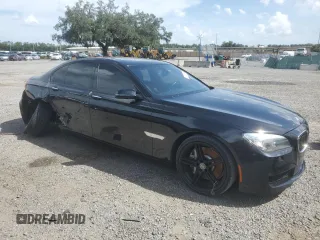2013 BMW 7 Series 750i with VIN WBAYA8C58DC996431, listed as a Copart auction lot 70366064 with 106,580 mi miles and Salvage Title. Bid and sale history available at DreamBid. Image 4.