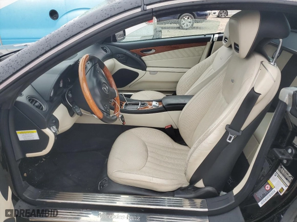 2009 Mercedes-Benz SL-Class V8 with VIN WDBSK71F39F152619, listed as a Copart auction lot 43771145 with 106,402 mi miles and Salvage Title. Bid and sale history available at carsss.com. Image 7.