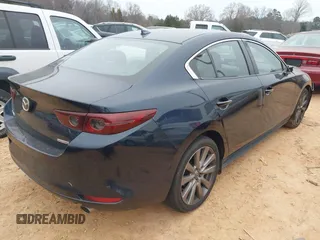 2019 Mazda 3 Preferred z VIN 3MZBPADL9KM107981, wystawiony jako IAAI lot #41196525 z przebiegiem 88 859 mil mil oraz . Historia ofert i sprzedaży dostępna na DreamBid. Obrazek 4.