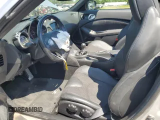 2012 Nissan 370Z Touring with VIN JN1AZ4FH3CM370910, listed as a Copart auction lot 65940005 with 23,009 mi miles and Salvage title. Bid and sale history available at DreamBid. Image 7.
