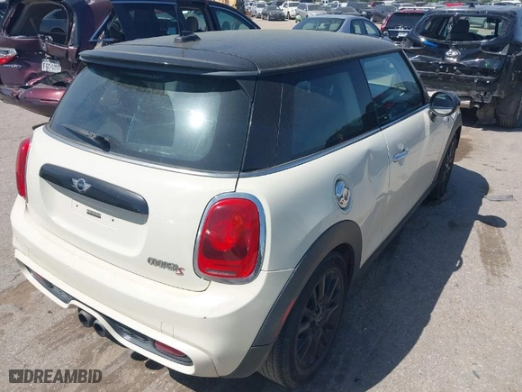 2015 MINI Cooper Hardtop S with VIN WMWXP7C50F2A34429, listed as a IAAI auction lot 41992816 with 160,316 mi miles. Bid and sale history available at carsss.com. Image 4.