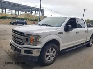 2019 Ford F-150 XL with VIN 1FTFW1E42KKF27037, listed as a IAAI auction lot 42777832 with 169,179 mi miles and . Bid and sale history available at DreamBid. Image 3.