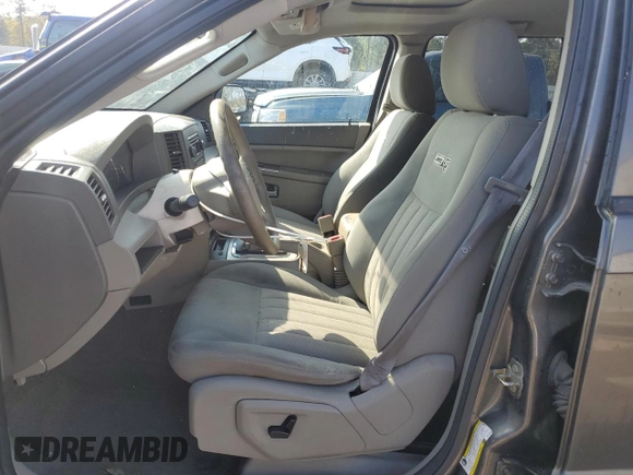 2006 Jeep Grand Cherokee Laredo with VIN 1J4HS48N96C357909, listed as a Copart auction lot 77551154 with 136,235 mi miles and Salvage Title. Bid and sale history available at carsss.com. Image 7.