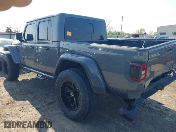 2022 Jeep Gladiator Mojave with VIN 1C6JJTEGXNL155838, listed as a IAAI auction lot 41968917 with 54,495 mi miles and . Bid and sale history available at DreamBid. Image 3.
