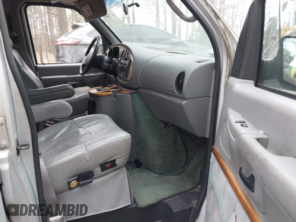 2002 Ford Econoline Cargo with VIN 1FDRE14W72HB82339, listed as a IAAI auction lot 41730429 with 214,165 mi miles and . Bid and sale history available at DreamBid. Image 5.