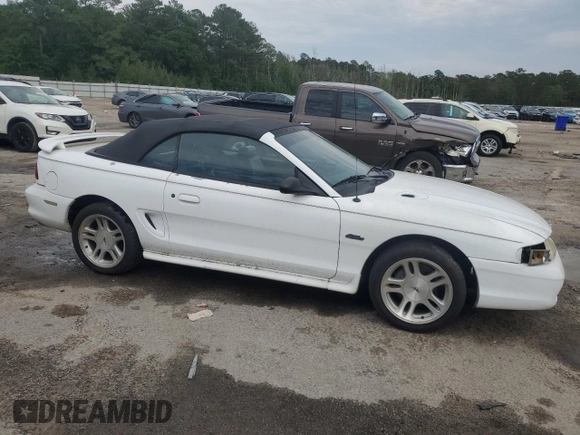 1998 Ford Mustang GT with VIN 1FAFP45X1WF263449, listed as a Copart auction lot 55851015 with 131,937 mi miles and Salvage title. Bid and sale history available at DreamBid. Image 4.