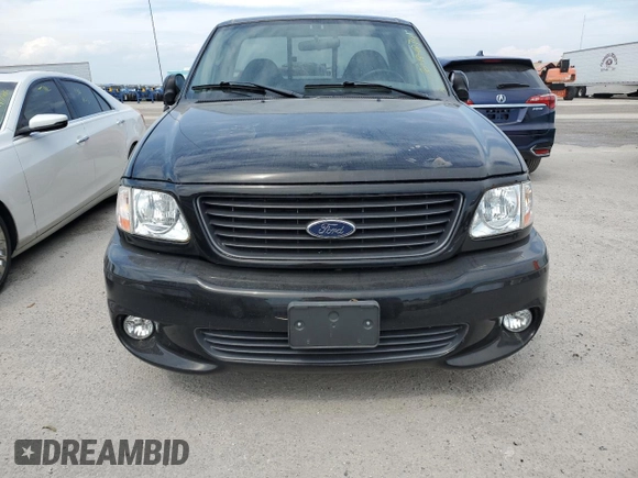 2003 Ford F-150 Lightning with VIN 2FTRF073X3CA69247, listed as a Copart auction lot 76484874 with 0 mi miles and Salvage Title. Bid and sale history available at carsss.com. Image 5.