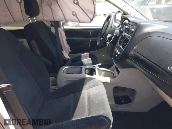 2014 Dodge Grand Caravan SXT with VIN 2C4RDGCG1ER429495, listed as a IAAI auction lot 42058513 with 136,936 mi miles and . Bid and sale history available at DreamBid. Image 5.