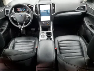 2021 Ford Edge SEL с VIN 2FMPK4J92MBA11014, выставлен на аукционе Copart как лот 61131095 с пробегом 64 316 миль миль и Списание • Salvage title. История ставок и продаж доступна на DreamBid. Изображение 8.
