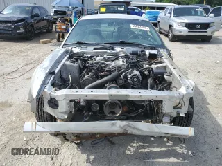 2003 Ford Mustang Standard с VIN 1FAFP40413F437836, выставлен на аукционе Copart как лот 58623395 с пробегом Не указан миль и Чистый • Clean title. История ставок и продаж доступна на DreamBid. Изображение 5.