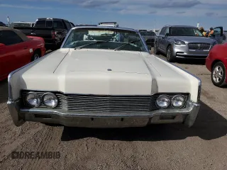 1966 Lincoln Continental with VIN 6Y86G414159, listed as a Copart auction lot 76480434 with 87,933 mi miles and Salvage Title. Bid and sale history available at DreamBid. Image 5.