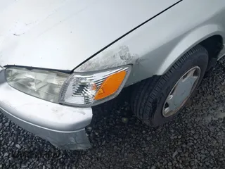 2000 Toyota Camry CE z VIN 4T1BG22KXYU690984, wystawiony jako IAAI lot #42222118 z przebiegiem 292 017 mil mil oraz . Historia ofert i sprzedaży dostępna na DreamBid. Obrazek 6.