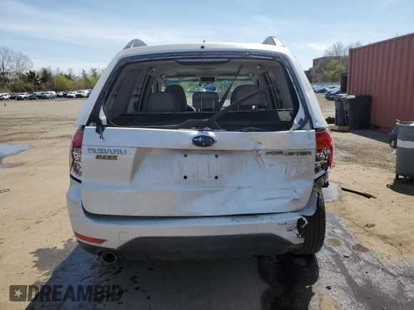 2009 Subaru Forester X с VIN JF2SH63629H722591, выставлен на аукционе Copart как лот 53990625 с пробегом 145 764 миль миль и Списание • Salvage title. История ставок и продаж доступна на DreamBid. Изображение 6.