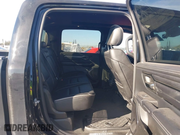 2023 Ram 1500 Limited with VIN 1C6SRFHT5PN542859, listed as a IAAI auction lot 41669646 with 80,045 mi miles and . Bid and sale history available at DreamBid. Image 8.