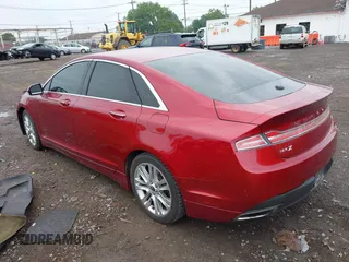 2014 Lincoln MKZ with VIN 3LN6L2GK3ER813789, listed as a IAAI auction lot 42884384 with 158,561 mi miles and . Bid and sale history available at DreamBid. Image 3.