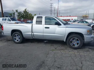 2011 Ram Dakota Bighorn/Lonestar with VIN 1D7RE3BK6BS636282, listed as a IAAI auction lot 41514885 with 295,847 mi miles. Bid and sale history available at carsss.com. Image 14.
